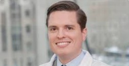 Dr. Adam Schmitt