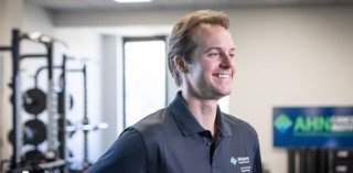 Dr. Colin Champ