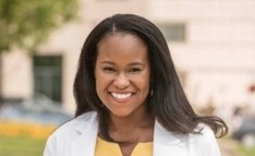 Dr. Folasade May