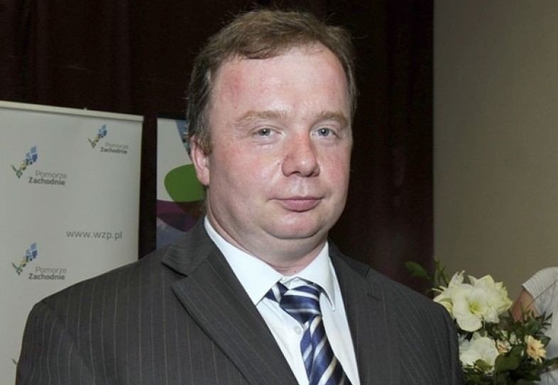 Dr. Tomasz Huzarski